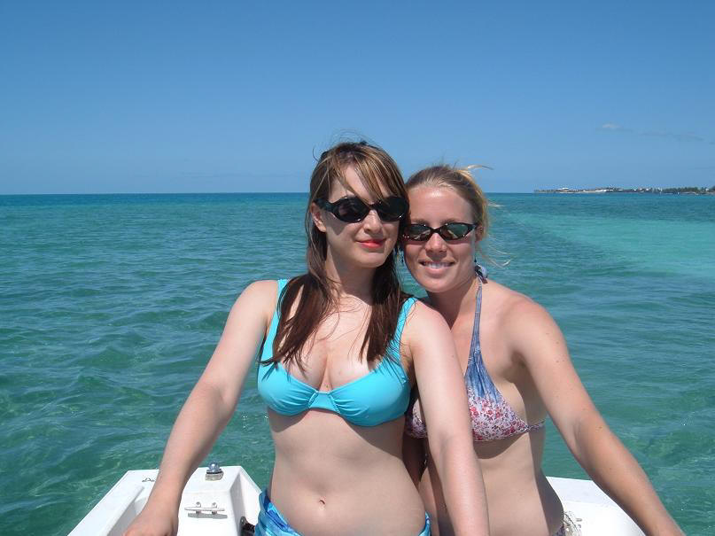 Photo of Charlotte Oxenham and Claire Porteous driving the boat in Somerset Bermuda.