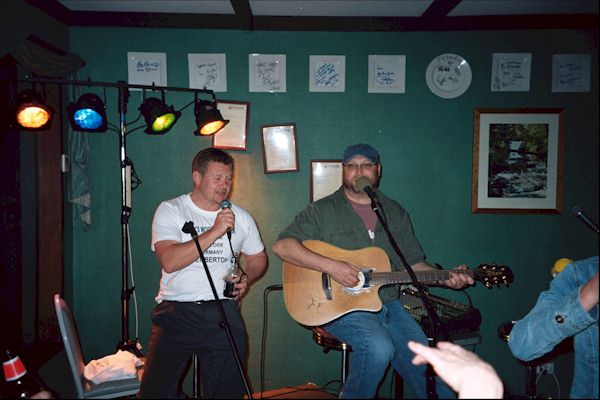 Ian and Ray singing on stage in Pemberton Western Australia.