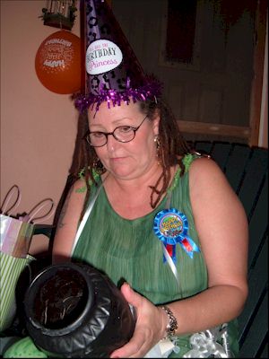 Anne Hollis opening birthday presents.