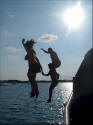 Charlotte, Steve, Erin and Ray jumping from the bow of the ship on May 24.